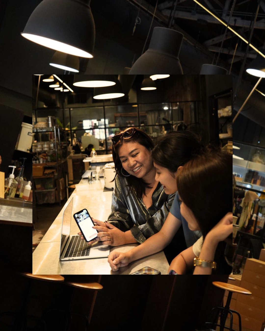 The Ohana team walking a local through the app over coffee