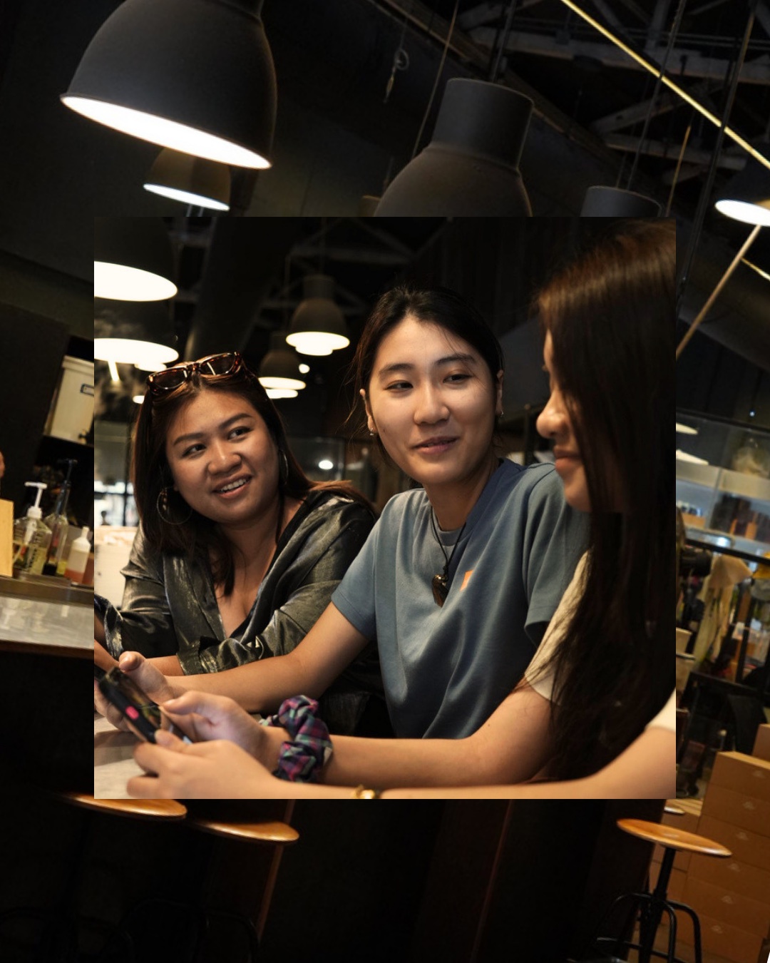 Locals chatting at a coffee meetup in Thonglor