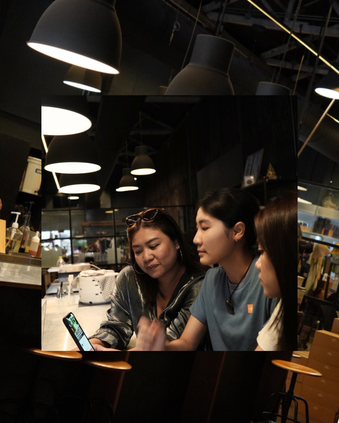 A small group looking at an experience in the Ohana app