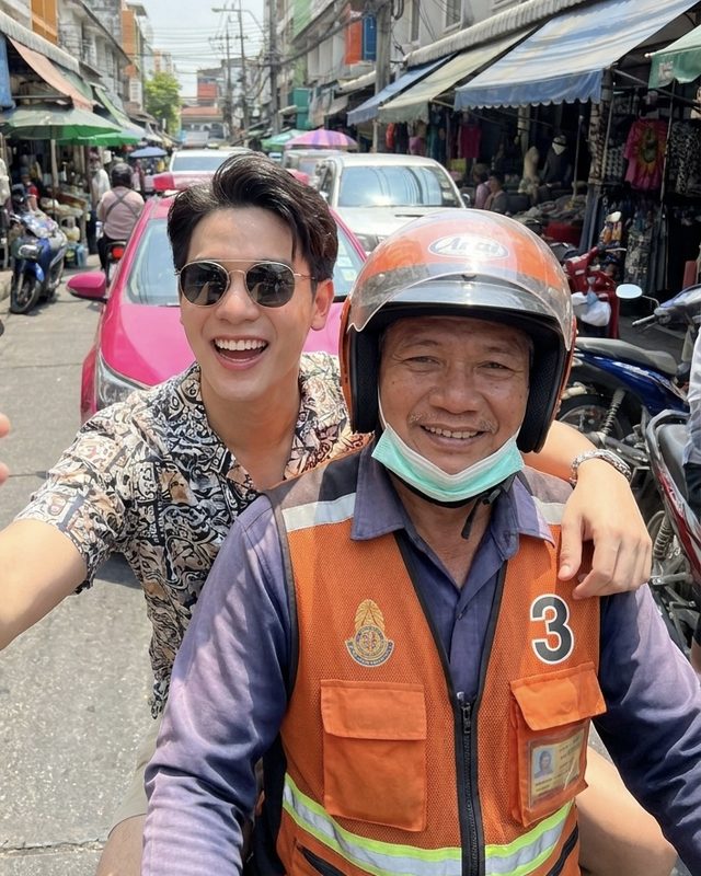 Riding on the back of a motorbike taxi through Bangkok traffic